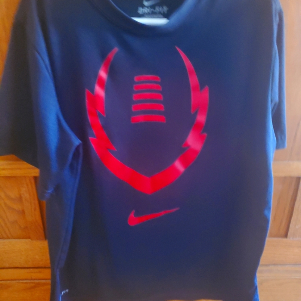 Nike Black T Shirt  black with red outlined football in good condition. BOGO